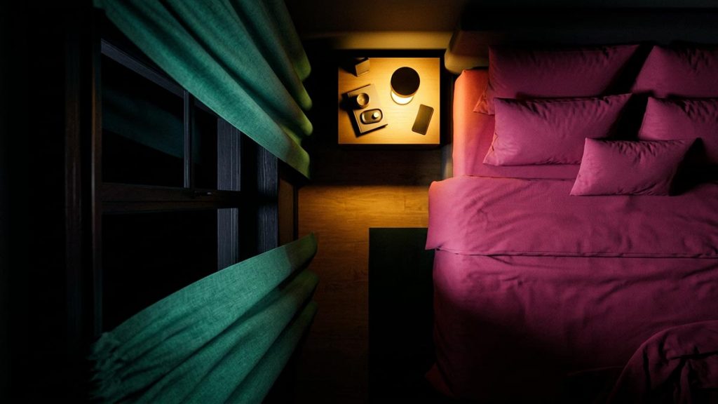 A still-life of a curtained window with a low lamp beside a made bed at night, illustrating the Dua for Safety at Night.