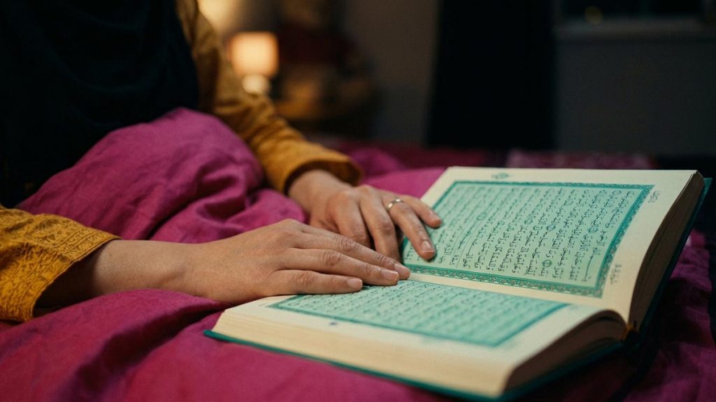 Close view of a Muslim woman's hands and the open Quran during the The Three Quls.