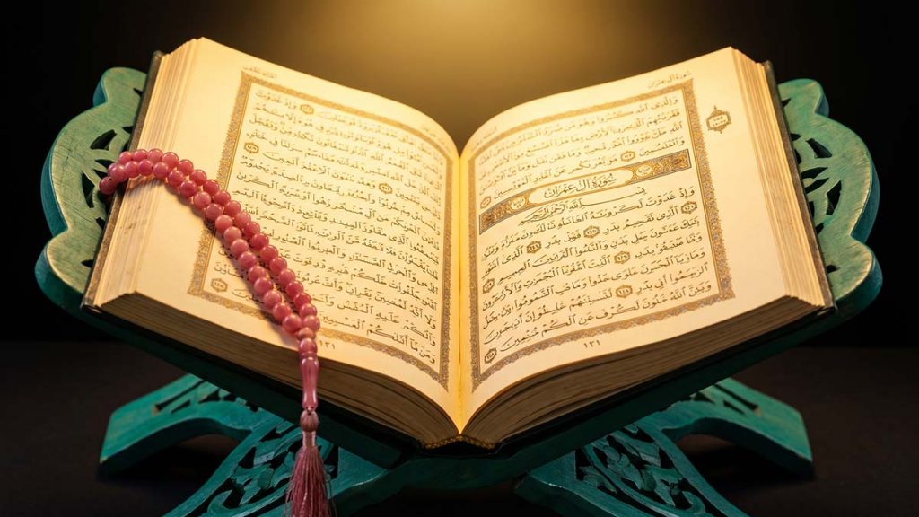 Open Quran at Surah Aal Imran recounting the Battle of Badr