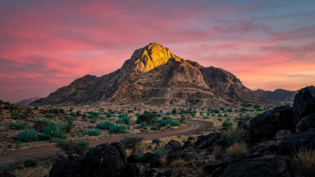 Mount Arafat illuminated by sunlight on the sacred Day of Arafah
