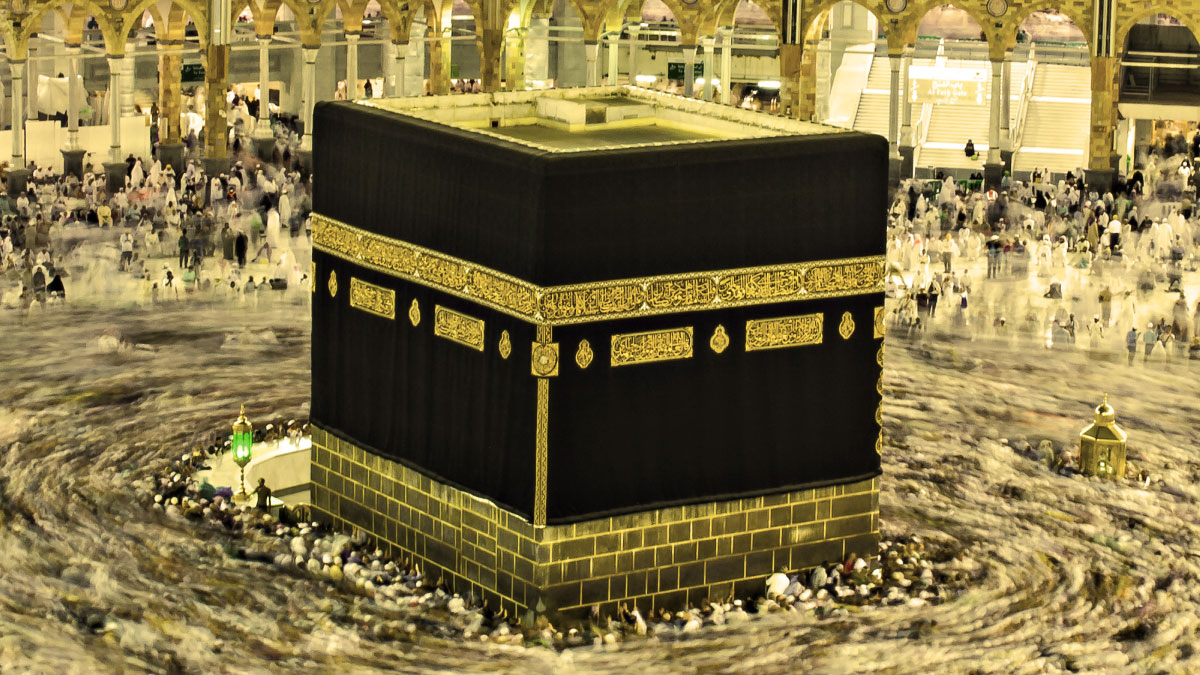 The Kaaba surrounded by worshippers.