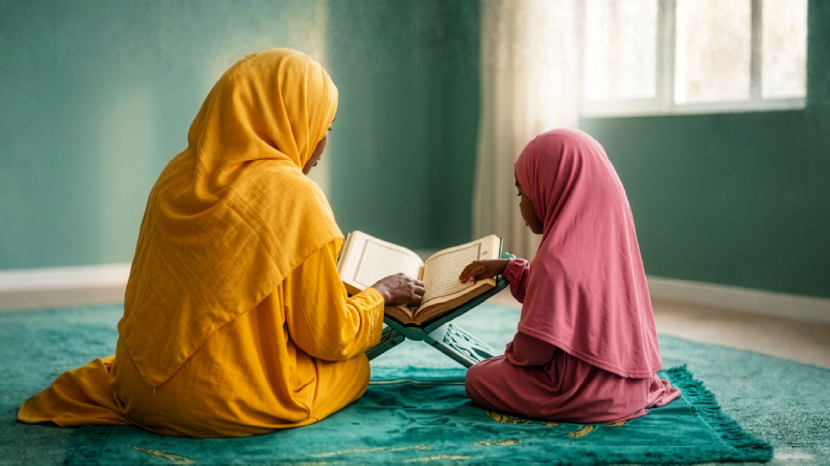 Muslim woman and daughter reading Surah Al-Asr in the Quran
